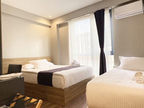 Standard Triple Room, Non Smoking | Premium bedding, minibar, desk, laptop workspace
