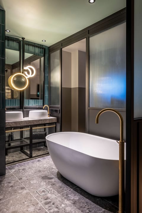 QT Junior Suite | Bathroom | Designer toiletries, hair dryer, bathrobes, slippers