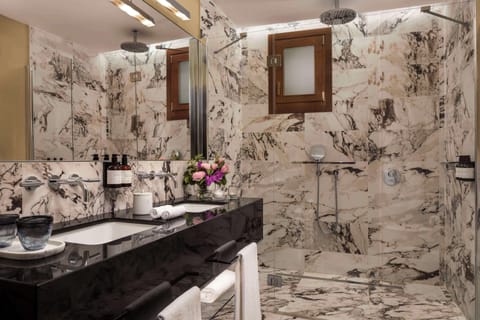 Rainfall showerhead, eco-friendly toiletries, hair dryer, bathrobes