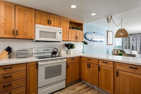 Whip up delicious meals! Our fully stocked kitchen with modern appliances is ready for your culinary adventures.