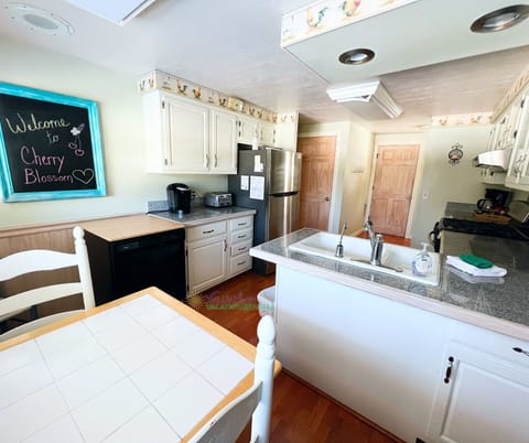 Kitchen with breakfast table. - Kitchen with breakfast table.