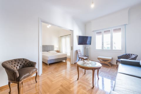 Apartment, 3 Bedrooms | Living area | Flat-screen TV