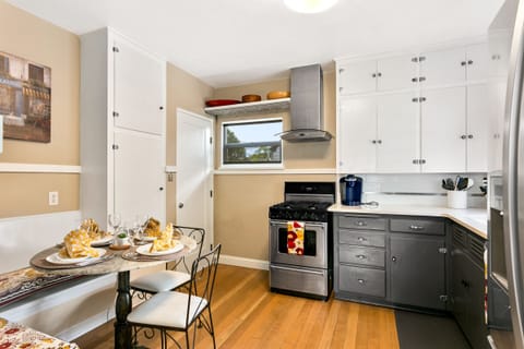 Classy kitchen/dining space with upgraded appliances.