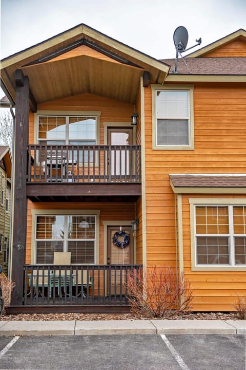 The second-floor balcony off the living room comes with a gas grill. 