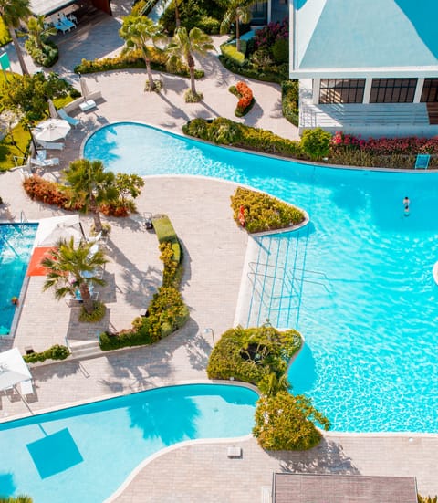 3 outdoor pools, cabanas (surcharge), pool umbrellas