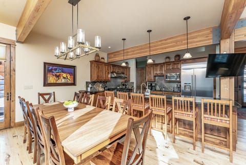 Formal dining area with additional barstool seating for up to 6 guests