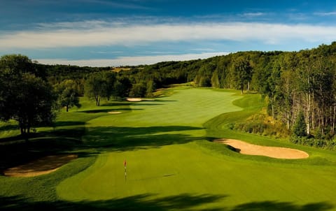 Play one of the two golf courses on property. 