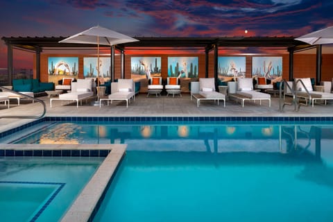 Outdoor pool, open 8:00 AM to 10:00 PM, cabanas (surcharge)