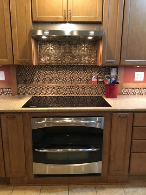 Induction cooktop and built-in double oven