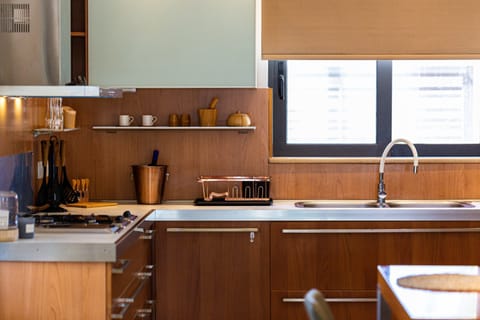 Fully equipped kitchen with modern appliances.