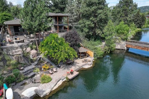 Riverfront Central Estate has 4 Bedrooms, 4.5 Bathrooms, indoor/outdoor living, 4 outdoor decks and patios, with 2 docks.