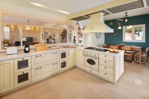 The fully equipped kitchen has an elegant yet functional design