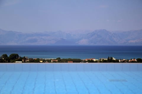 The sea view is complemented by the infinity pool