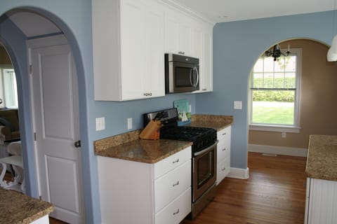 Gas range and microwave. Entrance to family room on left.