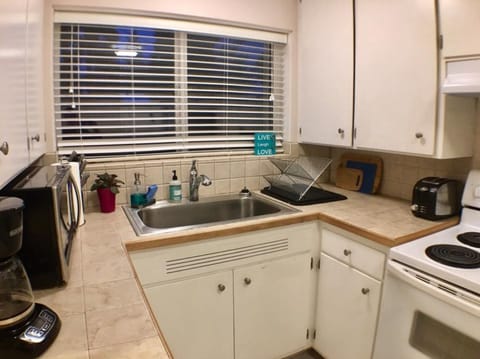 Small kitchen however very efficient, we just installed a new stove.