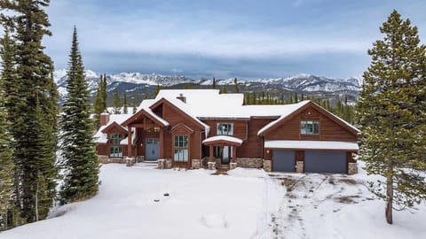 Front of Timber Lodge with gorgeous mountain backdrop