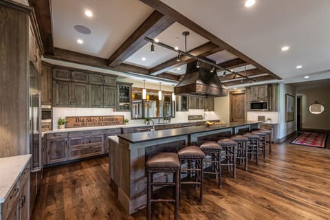 Spacious chef`s kitchen with barstool seating for up to 8 guests