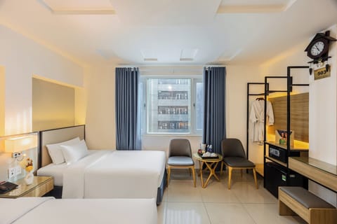 Family Room | Minibar, in-room safe, blackout drapes, iron/ironing board