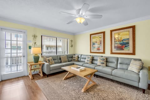 Spacious Living Area with Balcony Access - Main Level