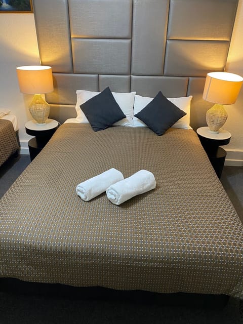 Premium bedding, blackout drapes, iron/ironing board, free WiFi