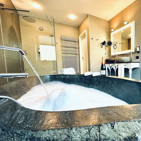 Suite Château | Bathroom | Designer toiletries, hair dryer, bathrobes, towels