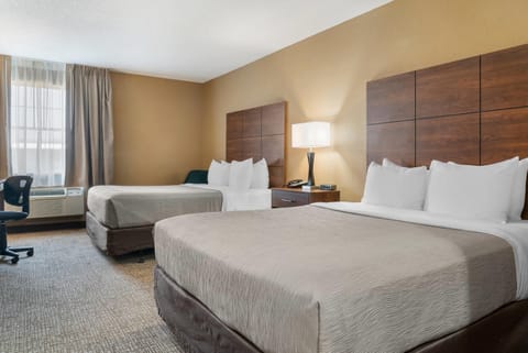 Standard Room, 2 Queen Beds, Non Smoking | Pillowtop beds, desk, laptop workspace, blackout drapes