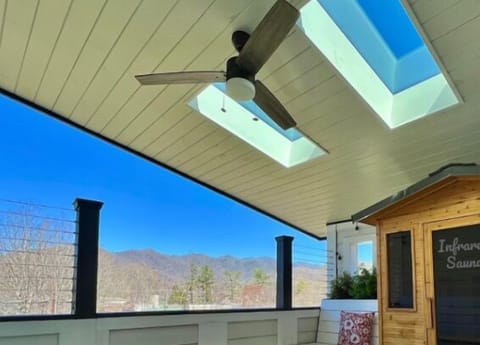 Third floor Sauna deck with gas firepit, stunning views and remote wifi.