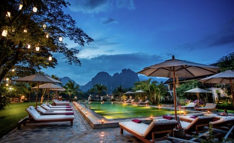 Outdoor pool, pool umbrellas, sun loungers