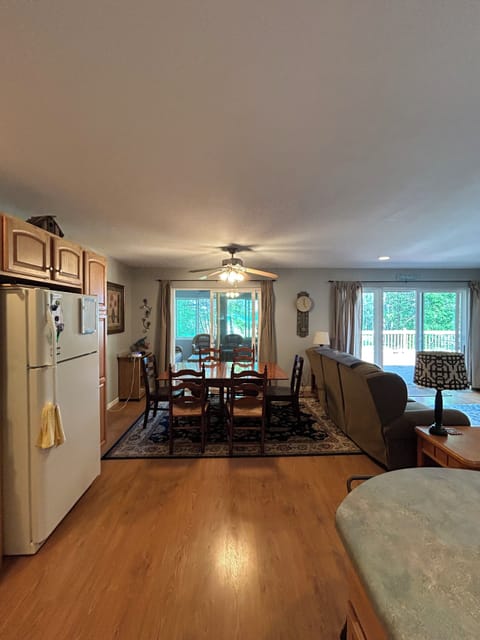 Main House - Dining room table. Extra tables and chairs in the closet.