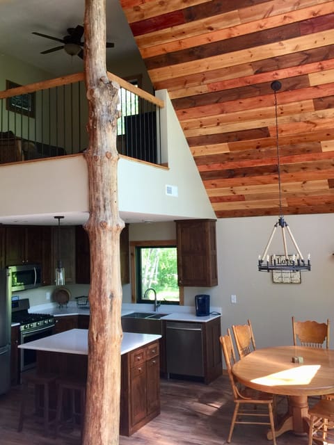 Kitchen, dining area, loft above