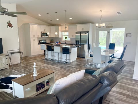 Entry area with large open living-dining and kitchen area.