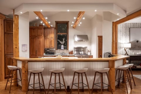 Pull up a chair and chat with chef with seating for 8 at the wrap around bar