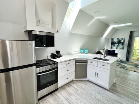 Premium Cabin, Non Smoking | Private kitchen | Full-size fridge, microwave, coffee/tea maker, highchair