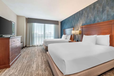 Blackout drapes, iron/ironing board, free cribs/infant beds