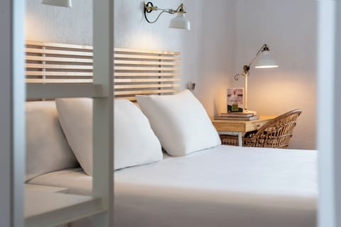 Standard Triple Room | Minibar, in-room safe, desk, soundproofing
