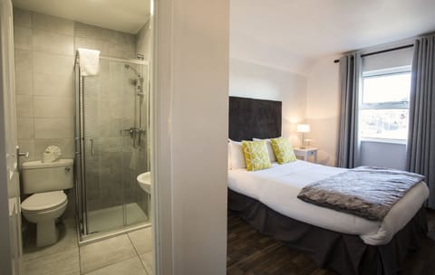 Basic Double Room, City View | Desk, iron/ironing board, free WiFi, bed sheets