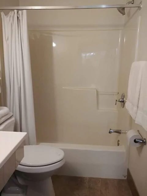Room, 2 Queen Beds | Bathroom | Towels, soap, shampoo, toilet paper