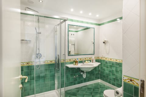 Junior Suite (for Single Use) | Bathroom | Bathtub, hair dryer, slippers, bidet