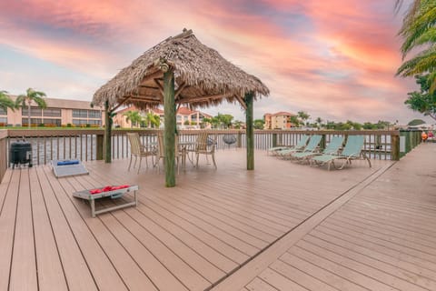 Large sundeck. Enjoy a game of cornhole and entertain under the tiki hut!!