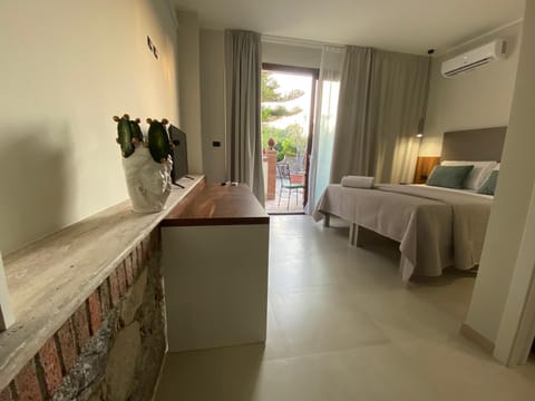 Minibar, desk, bed sheets