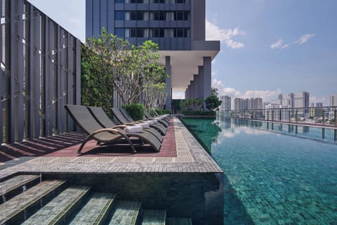 Outdoor pool, pool umbrellas, sun loungers