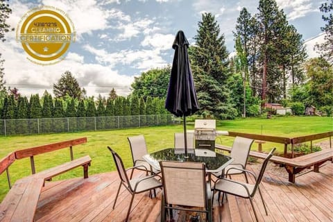 Enjoy hanging out on the large deck overlooking the huge fully fenced backyard.