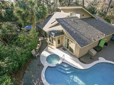 Areal view of backyard of home