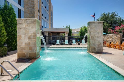 Outdoor pool, open 8:00 AM to 10:00 PM, pool umbrellas, sun loungers