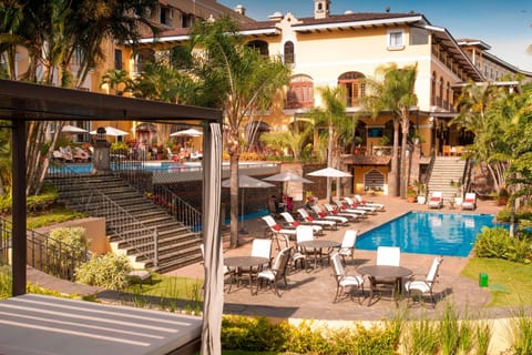 2 outdoor pools, open 6:00 AM to 9:00 PM, free cabanas, pool umbrellas