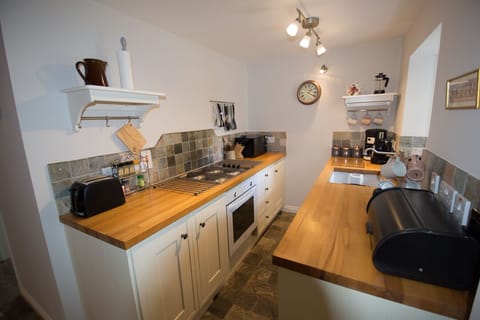 Kitchen - well equipped including dishwasher, microwave and coffee maker