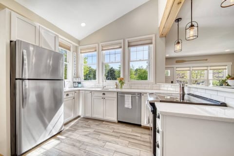 Elevate your culinary experience in our open layout kitchen where style meets functionality. Perfect for creating memorable meals, this space is flooded with natural light from our ample windows.