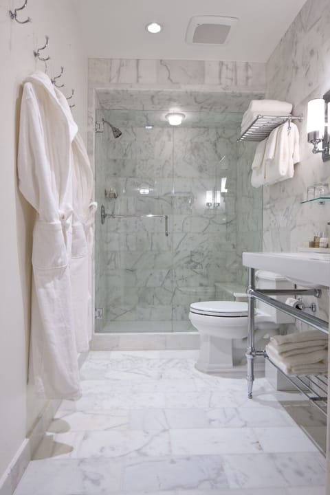 Combined shower/tub, designer toiletries, hair dryer, bathrobes