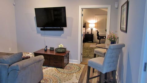 From the sitting area looking into the bedroom. 