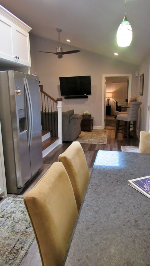 Looking from the kitchen into the sitting room (bedroom door on the right)